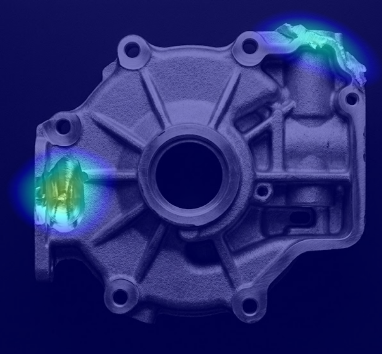 An illustration of defect detection metal part casting showing the anomalous area highlighted in bright colour.
